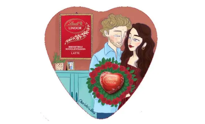 Confezione di PRALINE CON CIOCCOLATO AL LATTE E MORBIDO RIPIENO (a forma di cuore)