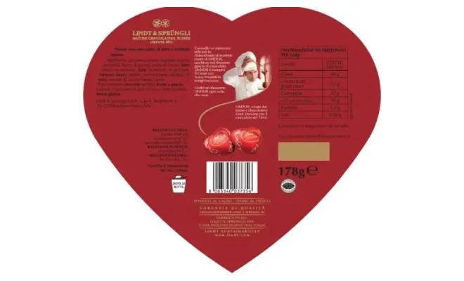 Confezione di PRALINE CON CIOCCOLATO AL LATTE E MORBIDO RIPIENO ( a forma di cuore)